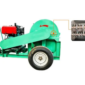 Large wood sawdust crusher machine processing logs and branches into fine sawdust for biomass energy, wood pellet production, and industrial applications