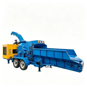 Industrial wood shredder machine processing logs, branches, wood scraps, and biomass waste into reusable materials for recycling